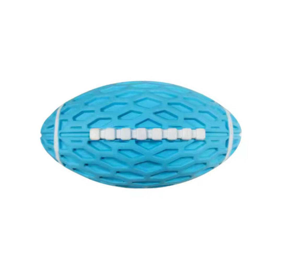 Honeycomb squeaky rugby ball